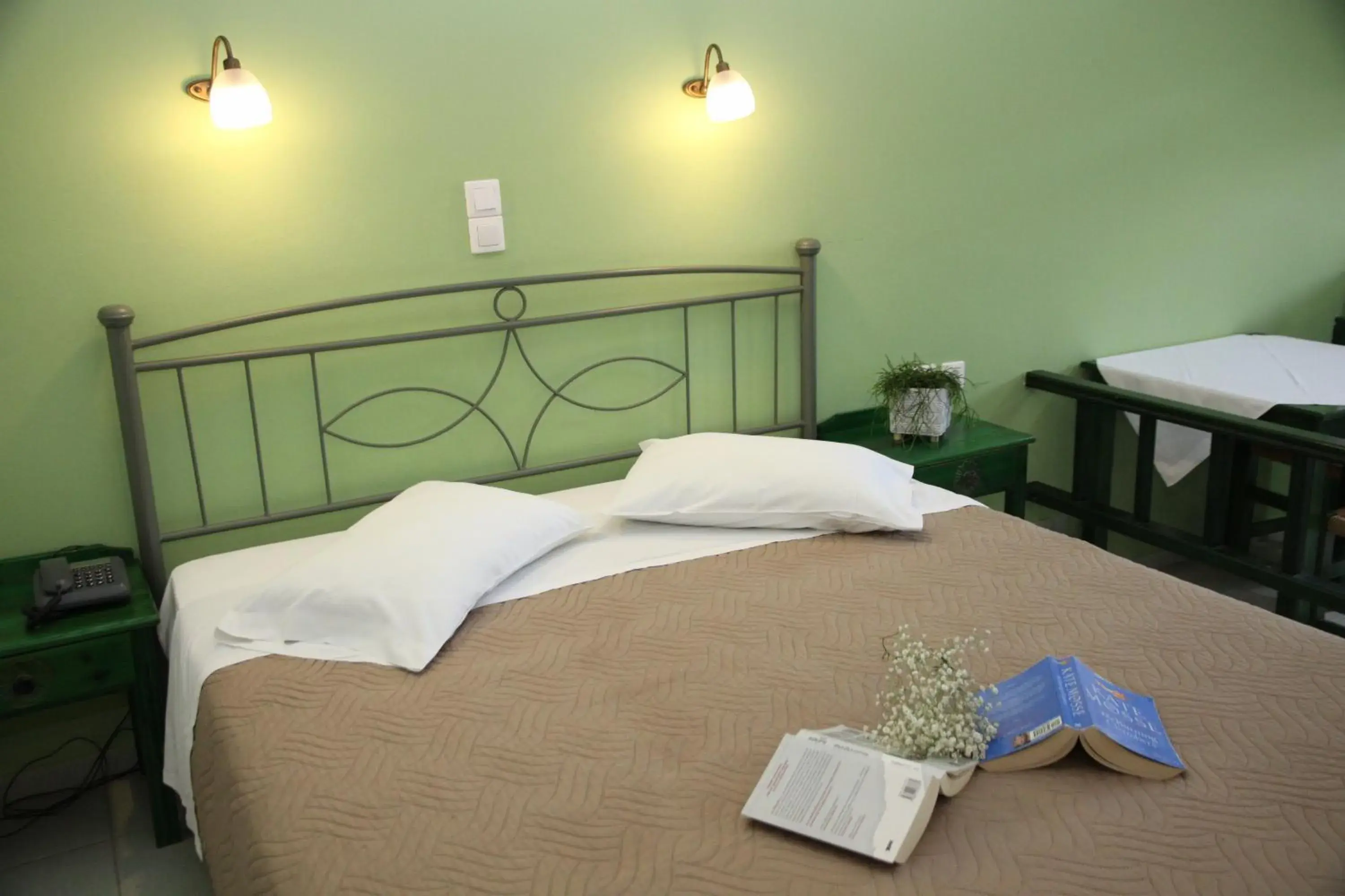 Bed in Apollon Hotel Apartments Bed in Apollon Hotel Apartments