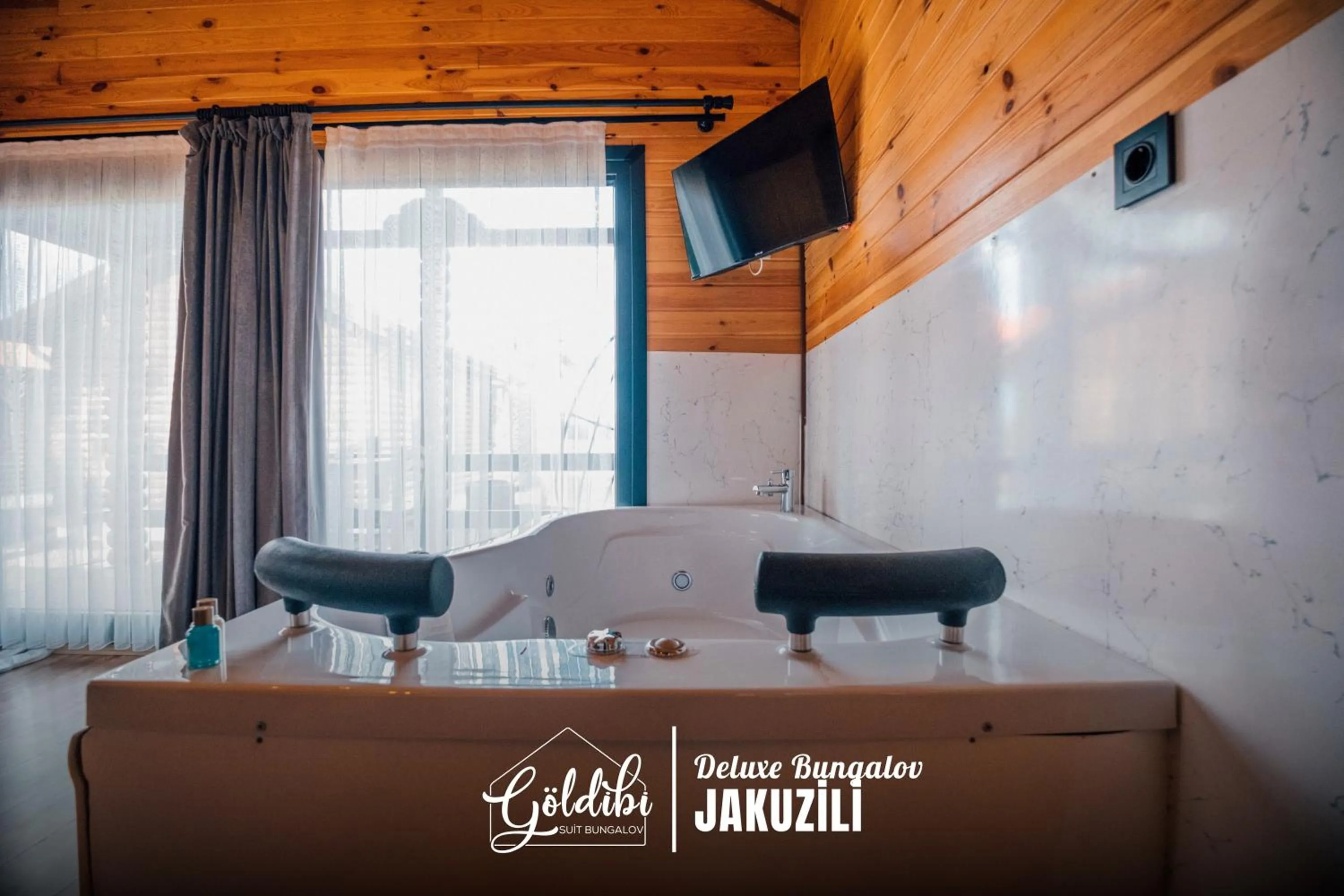 Communal lounge/ TV room in Sapanca Göldibi Suit Bungalov