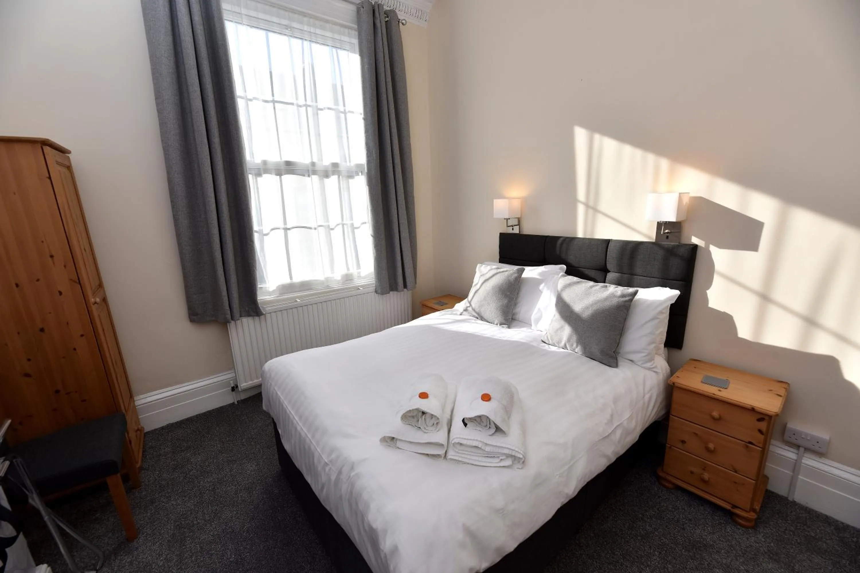 Bed in Phoenix Court Hotel