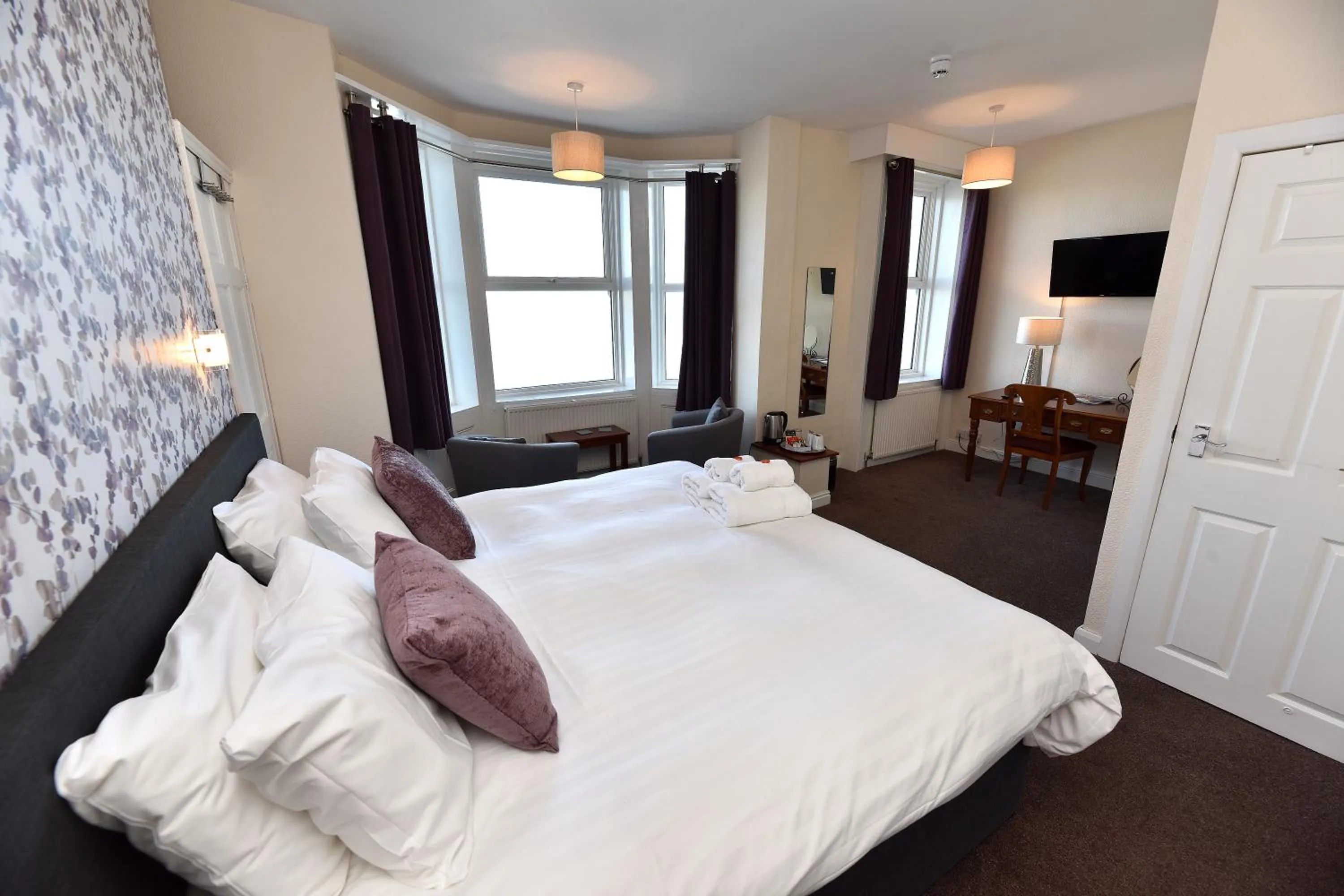 Bed in Phoenix Court Hotel