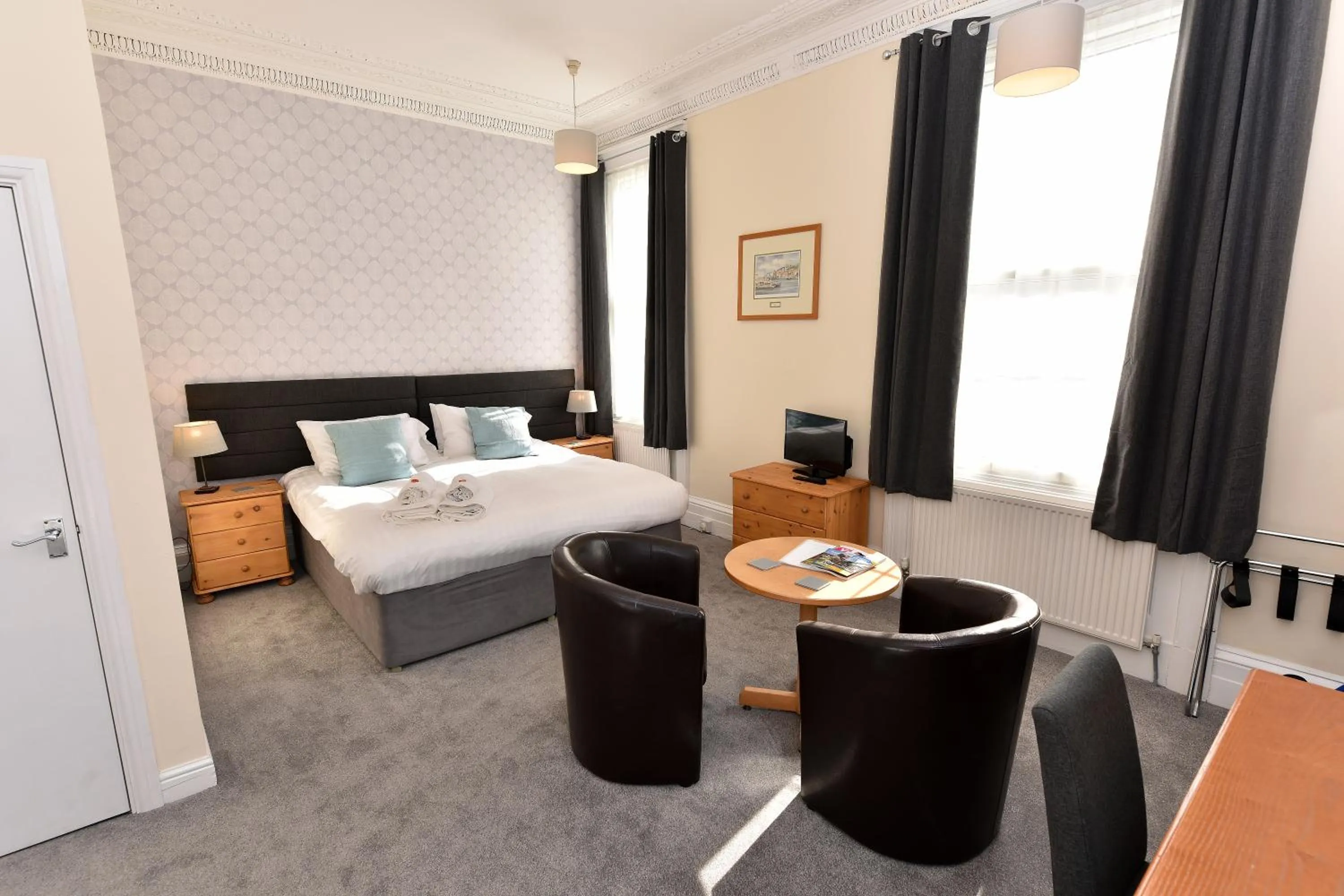 Bed in Phoenix Court Hotel