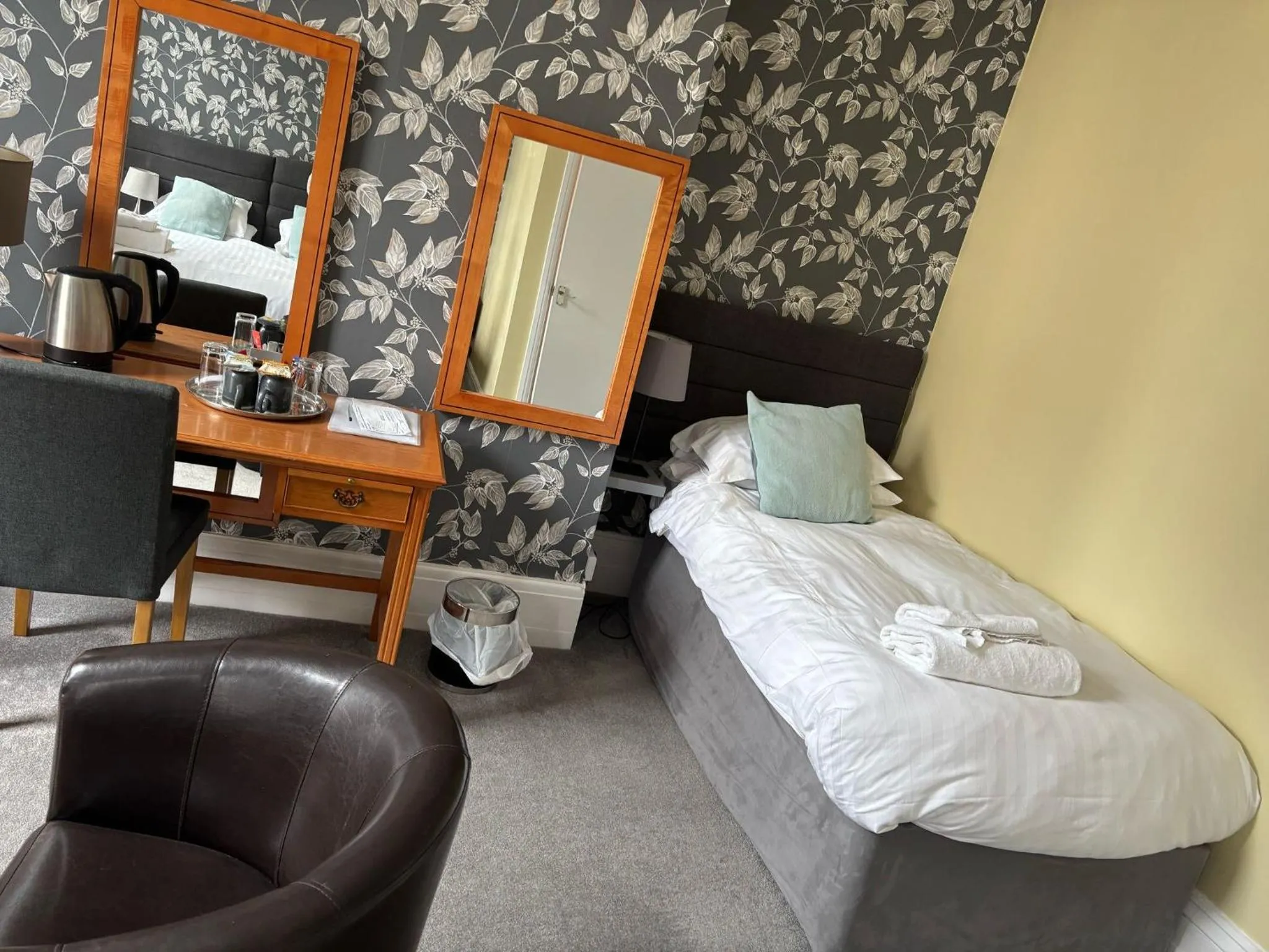 Bed in Phoenix Court Hotel