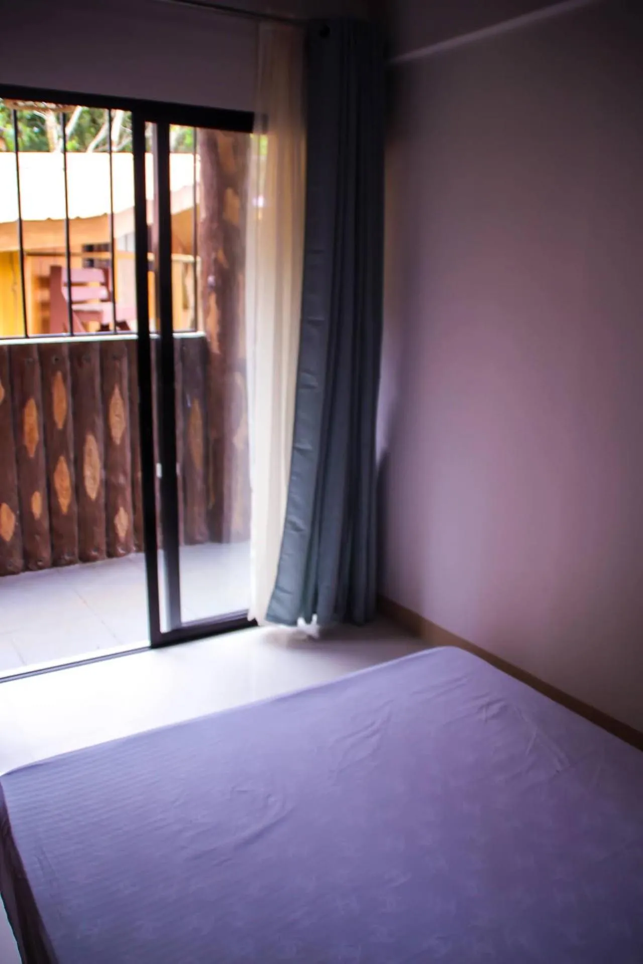 Bed in Camote's Lake Retreat