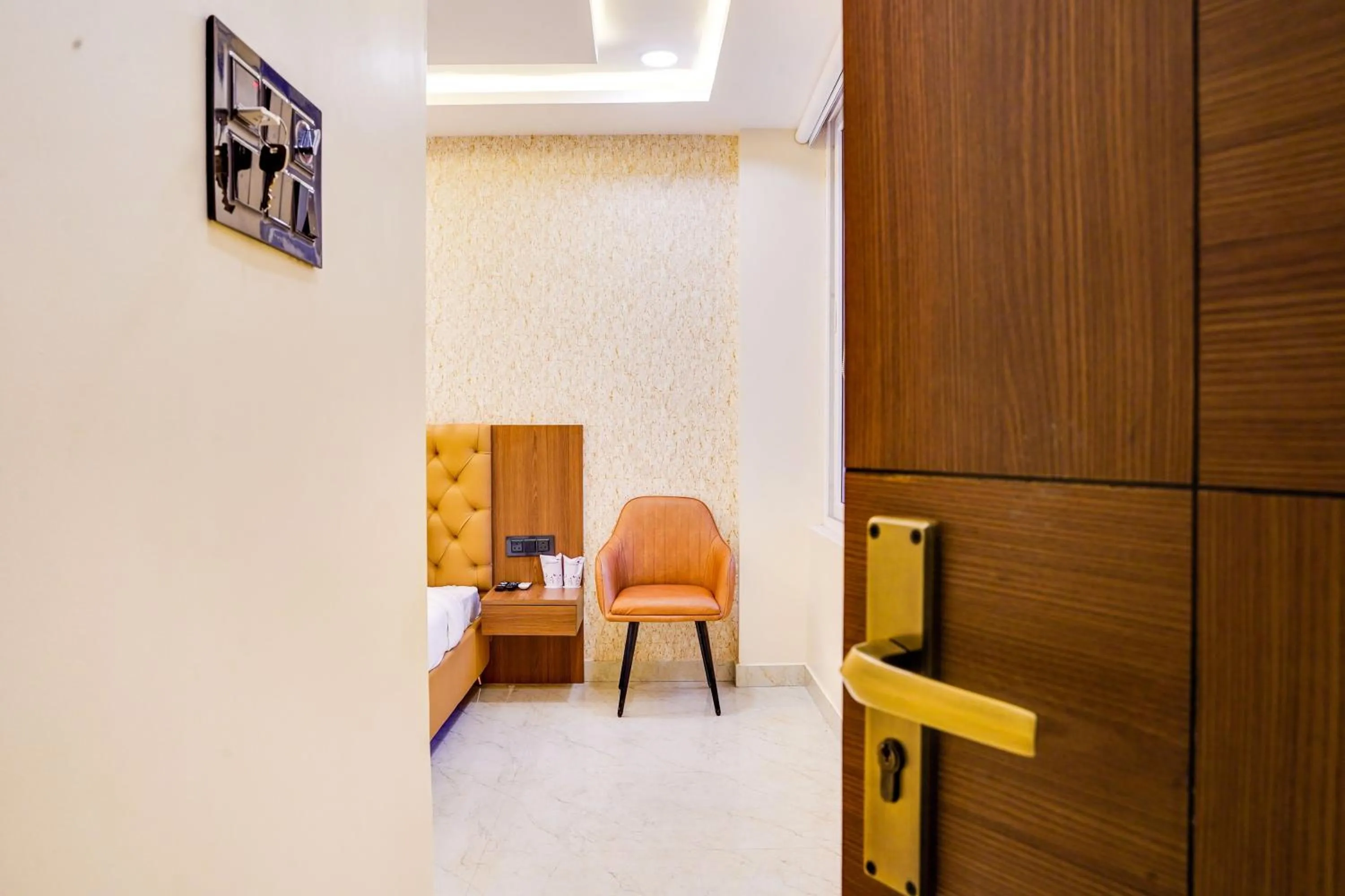 Bedroom in Super HOTEL O ANJANEY PALACE