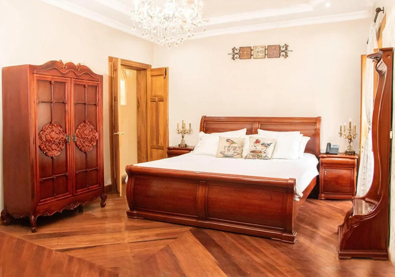 Bed in Hotel Boutique Casa Ruth en Cuenca