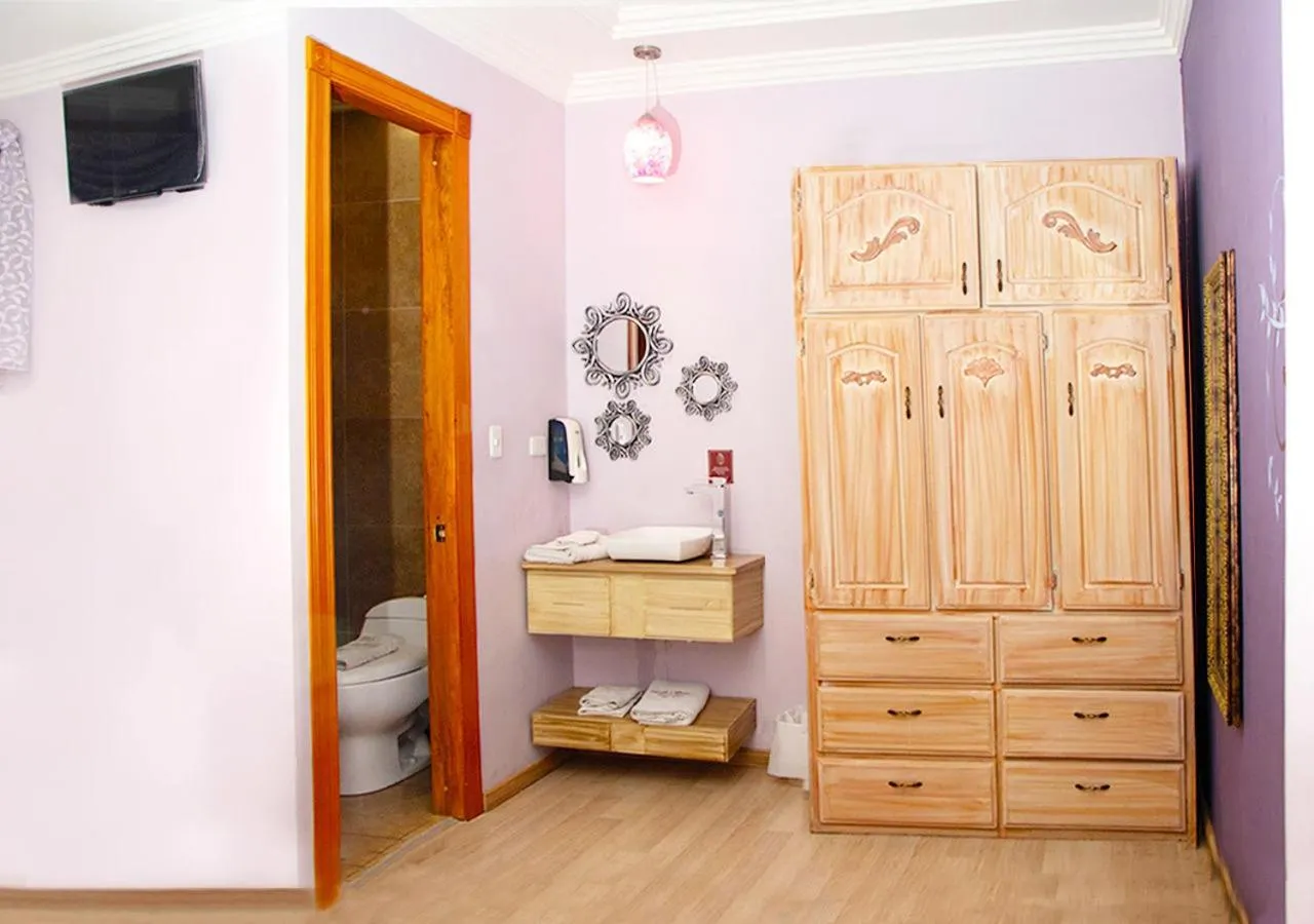 Bed in Hotel Boutique Casa Ruth en Cuenca