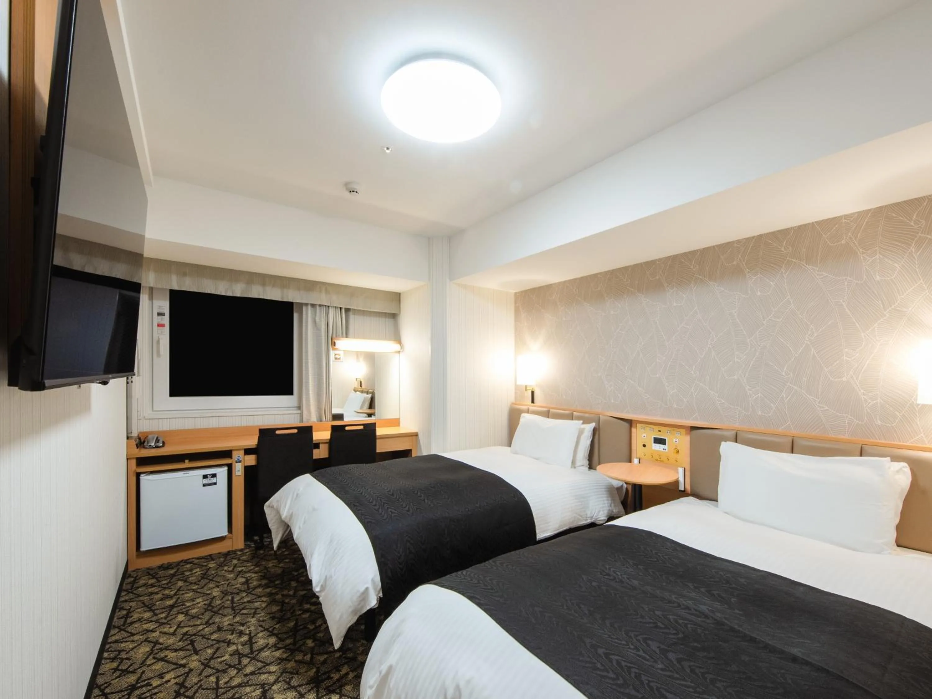 Photo of the whole room, Bed in APA Hotel & Resort Osaka Namba Ekimae Tower