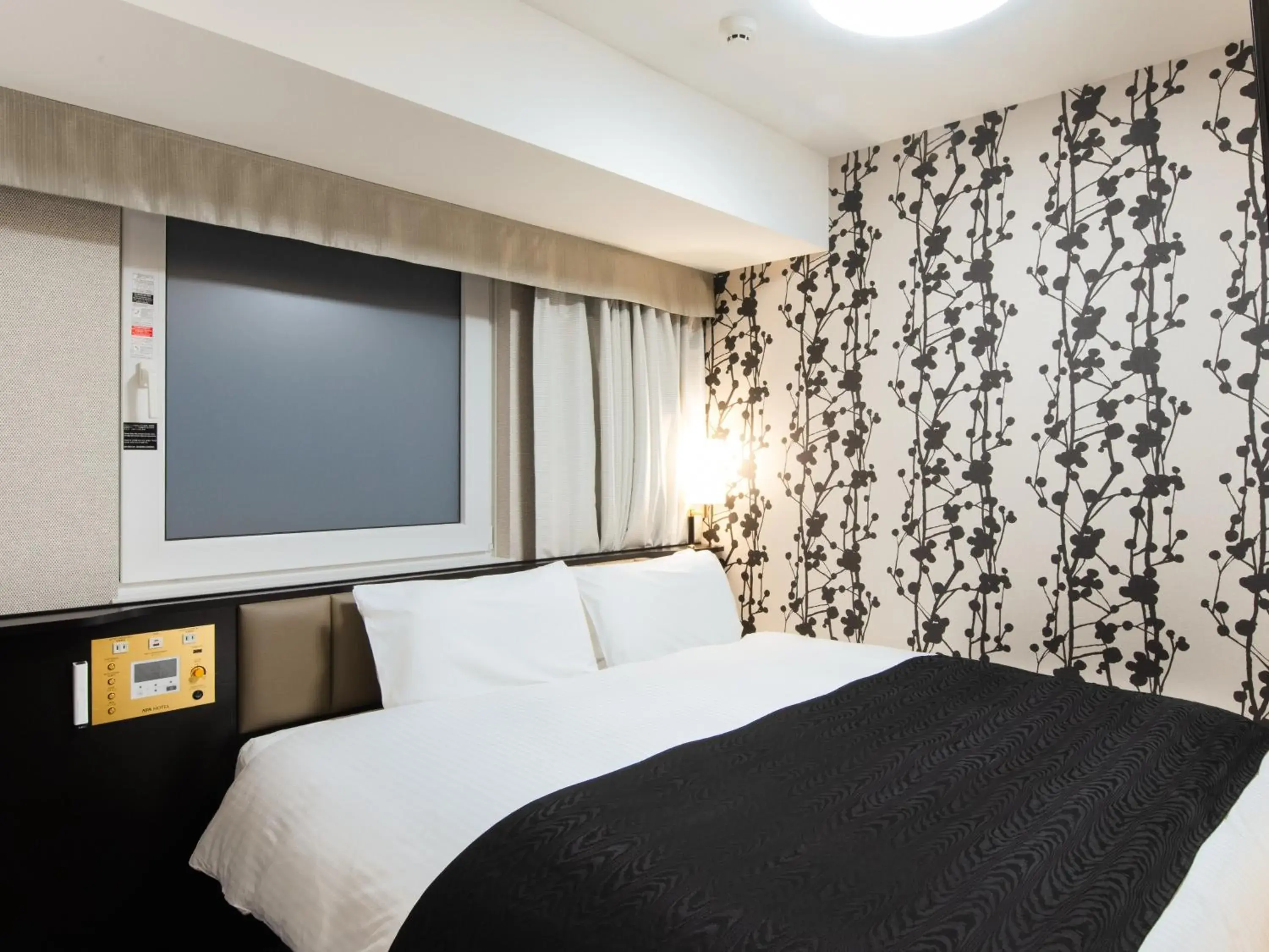 Photo of the whole room, Bed in APA Hotel & Resort Osaka Namba Ekimae Tower Photo of the whole room, Bed in APA Hotel & Resort Osaka Namba Ekimae Tower