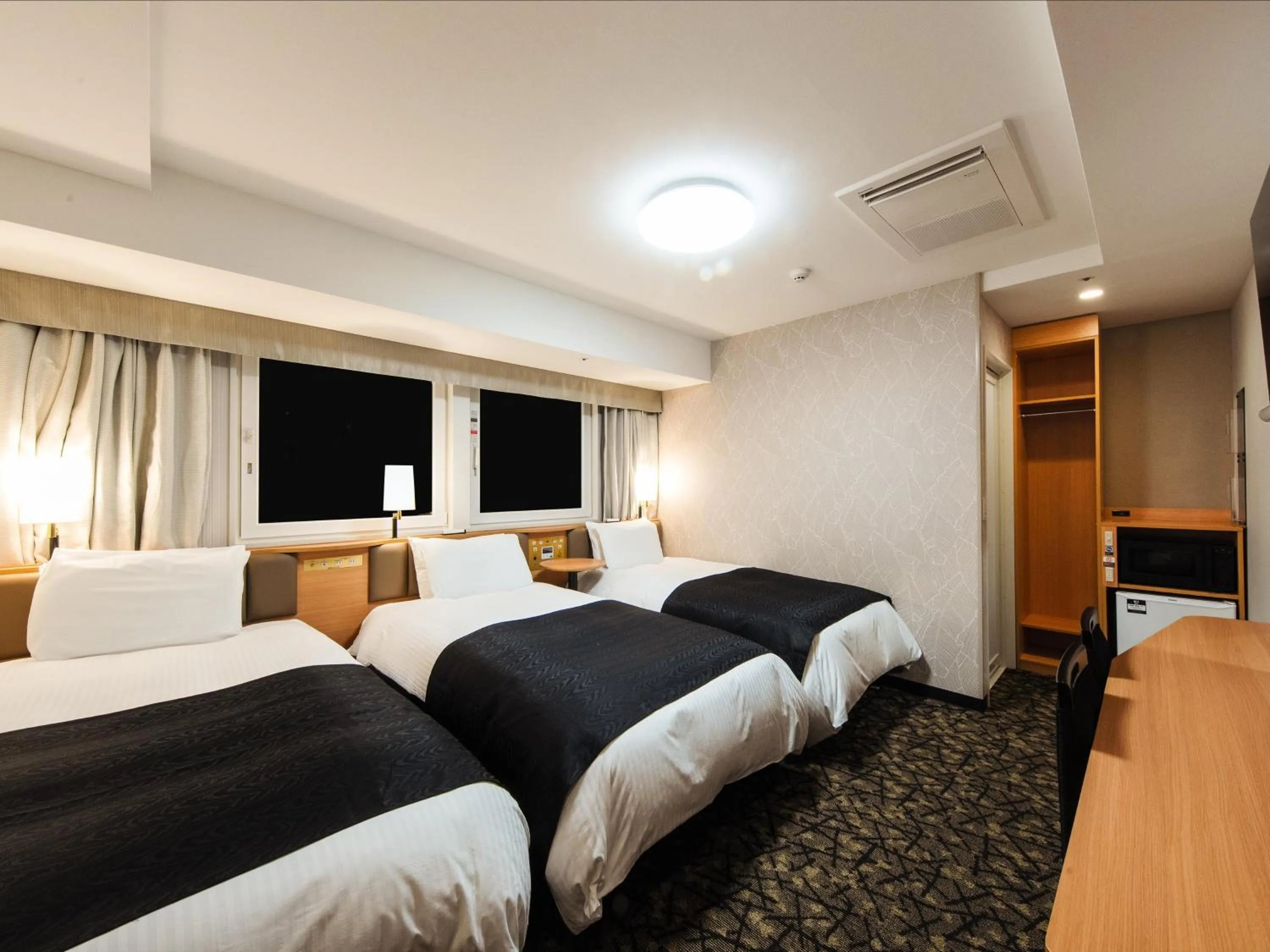 Photo of the whole room, Bed in APA Hotel & Resort Osaka Namba Ekimae Tower
