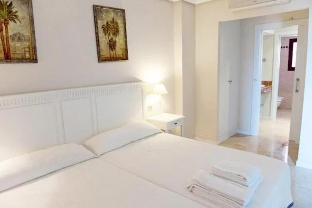 Bed in Apartamentos Manilva Green