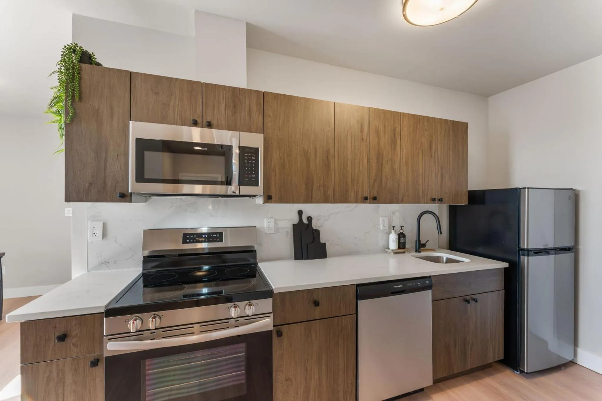 kitchen in 4211 Suites