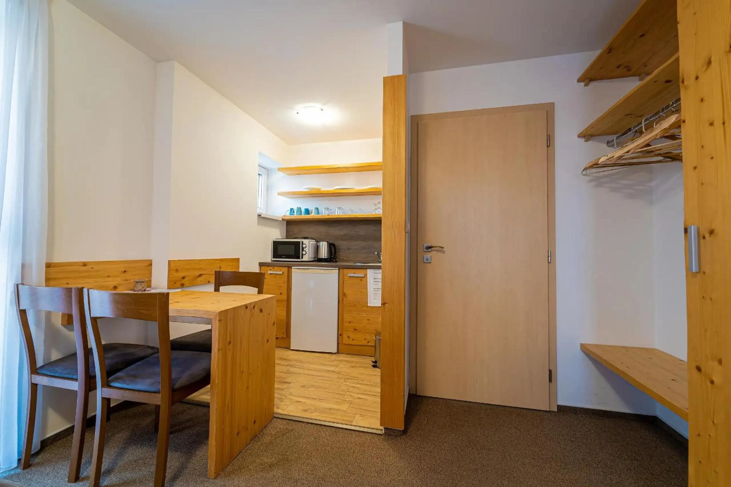 Kitchen or kitchenette in Aparthotel Belveder