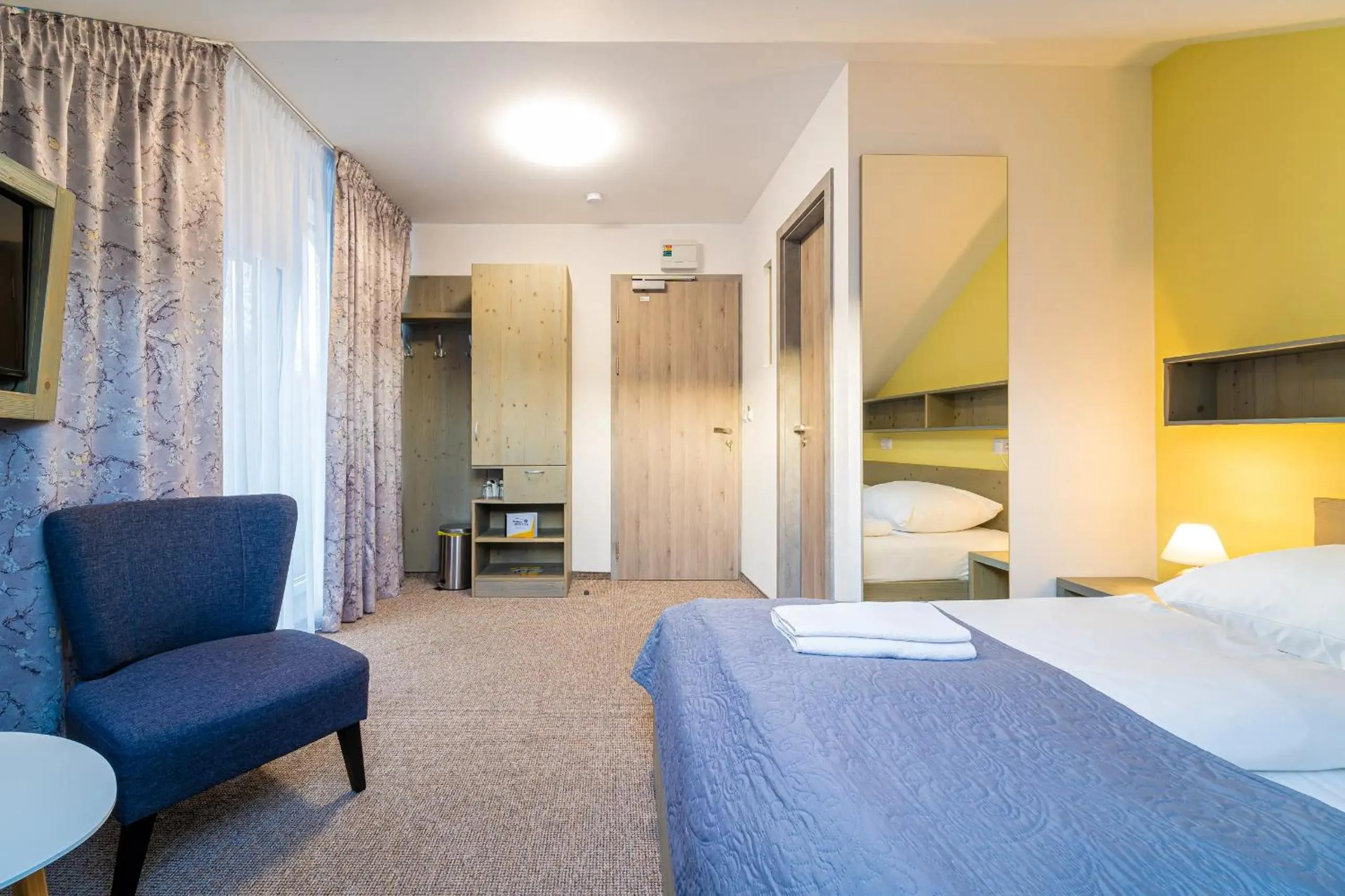 Bed in Aparthotel Belveder