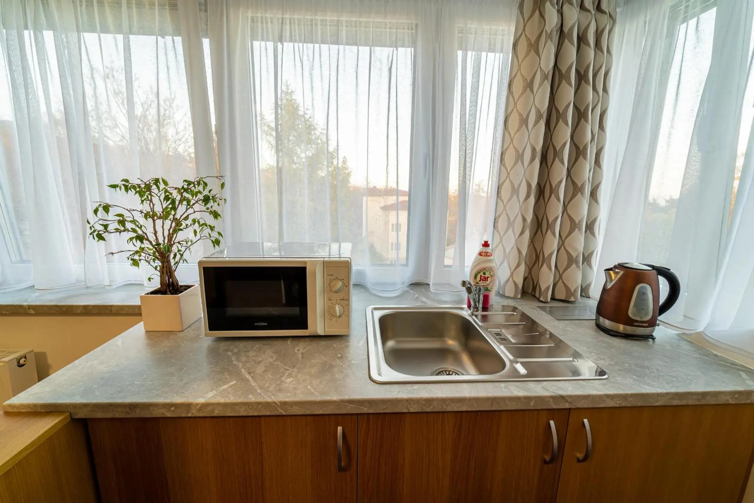 Kitchen or kitchenette in Aparthotel Belveder