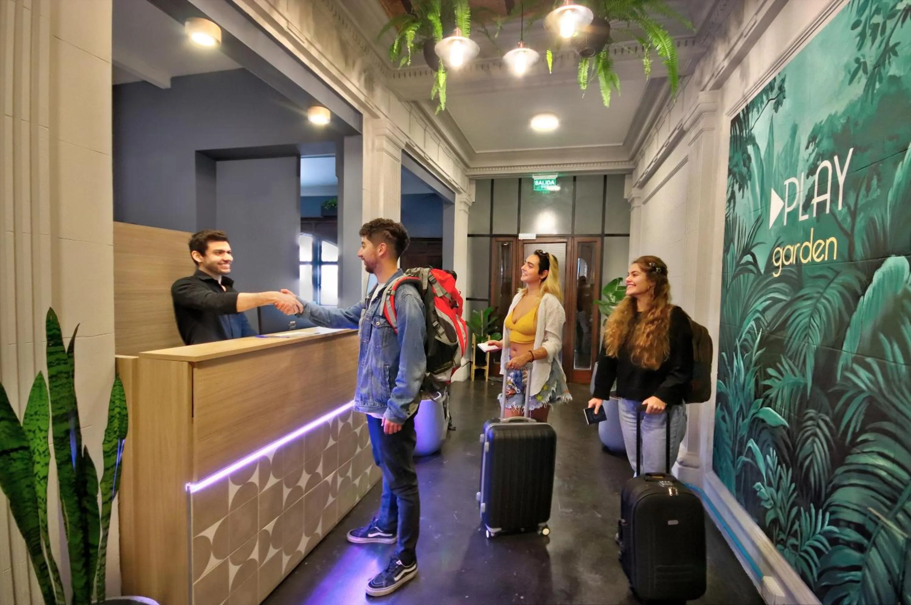 Staff in Play Hostel Garden