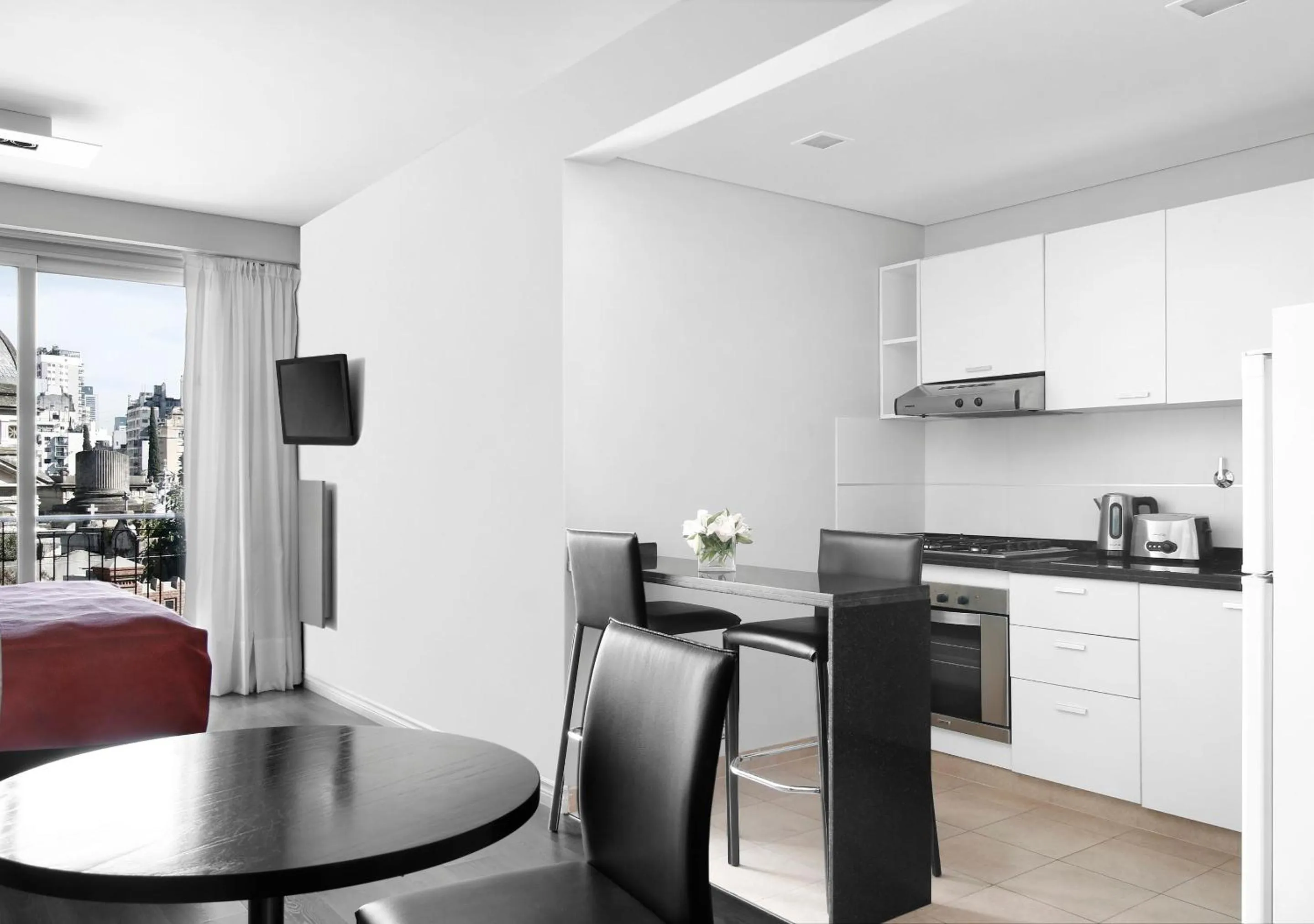 Kitchen or kitchenette in Reco by DOT Suites