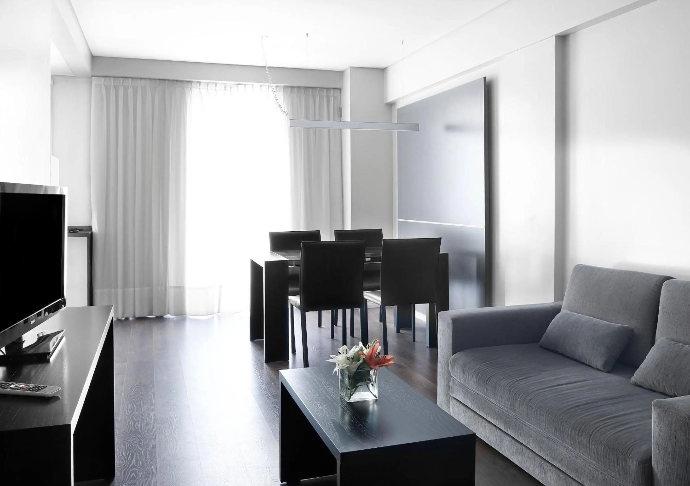 Living room in Reco by DOT Suites