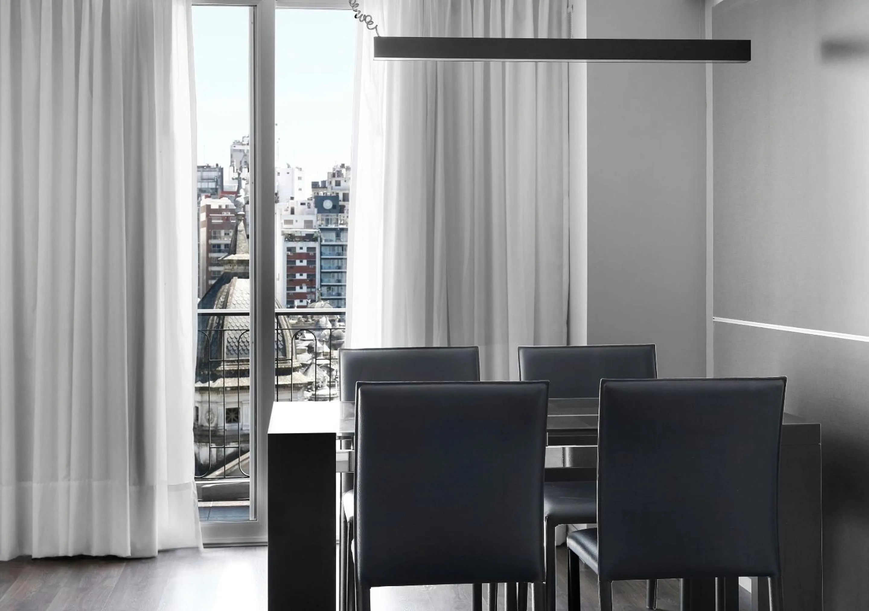 Seating area in Reco by DOT Suites