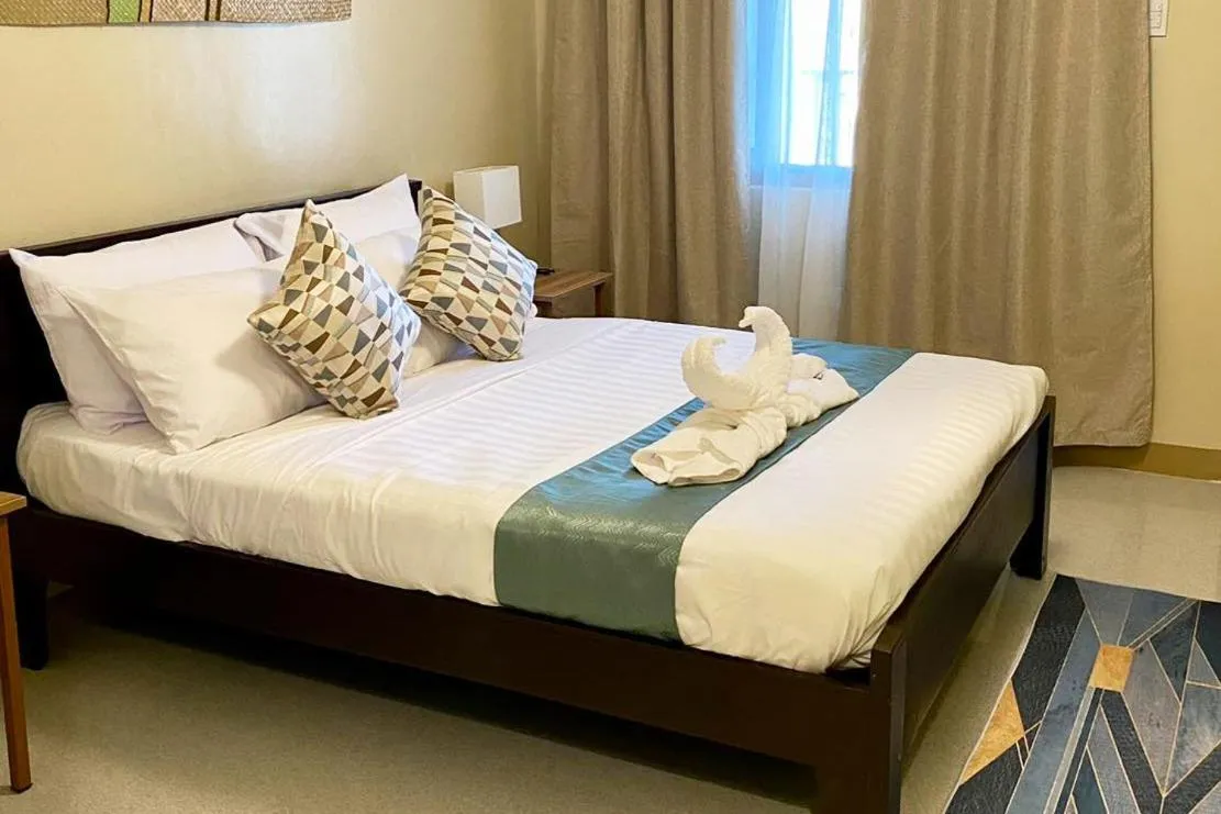 Bed in La Patria Baybay Tourist Inn powered by Cocotel