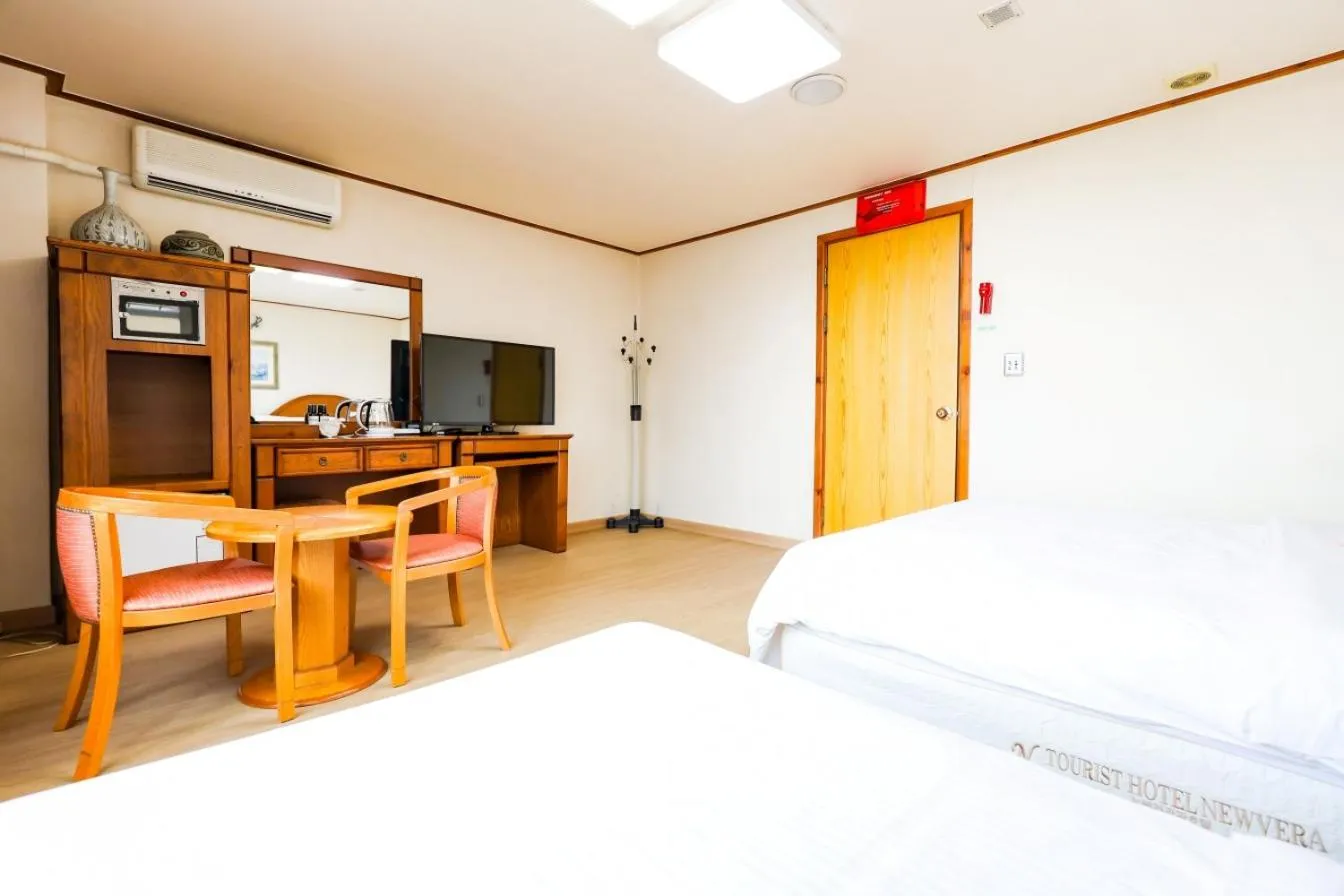 Bed in Newvera Hotel