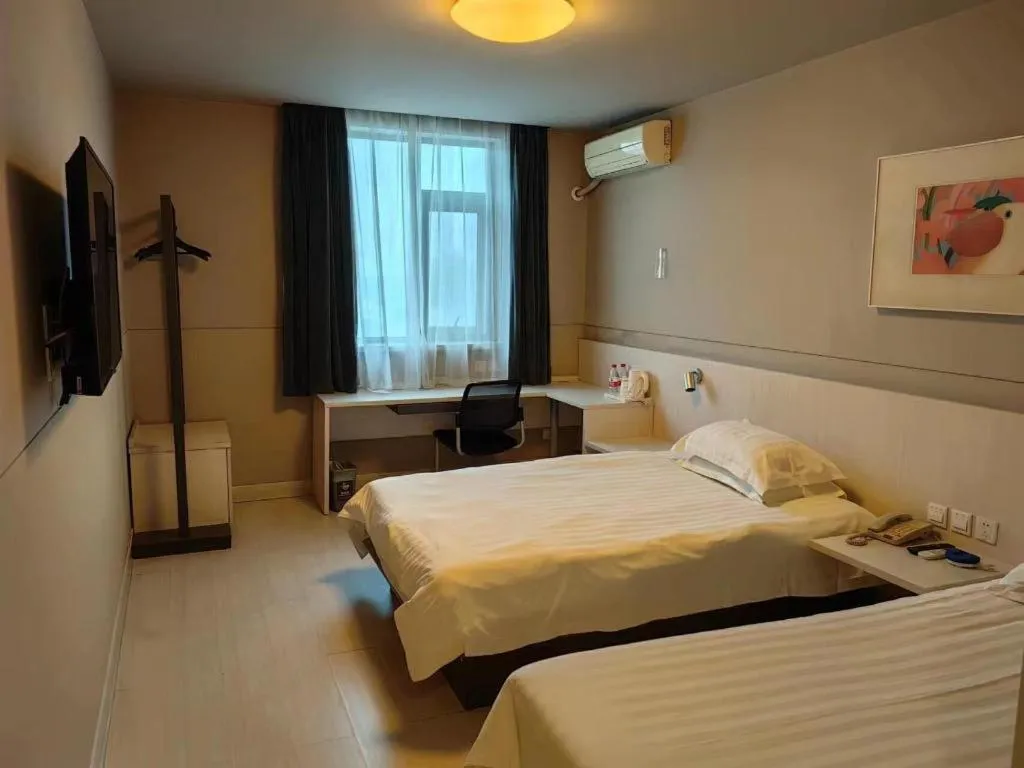 Bed in Jinjiang Inn Shanghai Qingpu