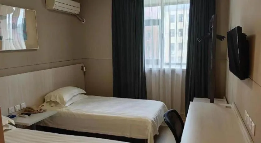 Bed in Jinjiang Inn Shanghai Qingpu