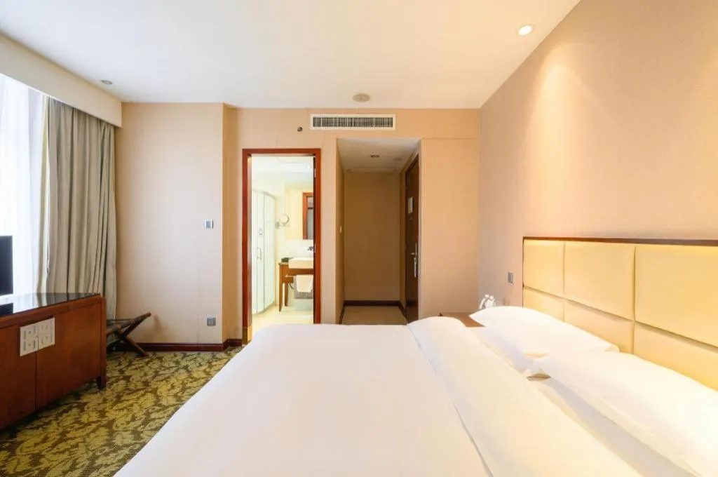 Bed in Xiamen Fortune Hotel