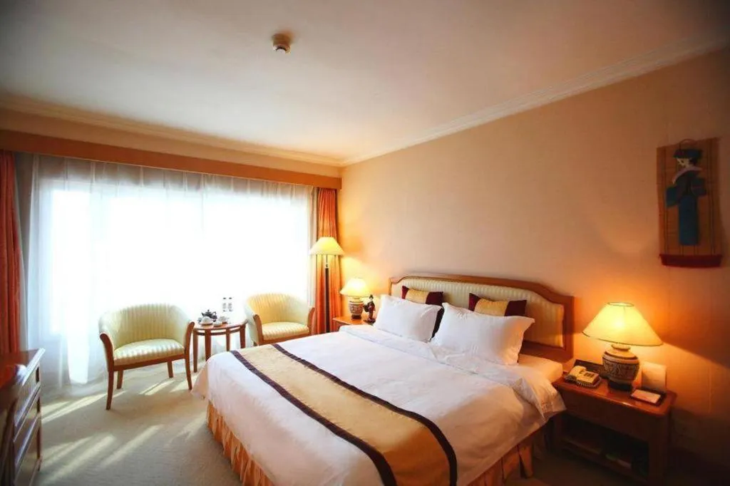 Bed in Dalian Zhongshan Hotel