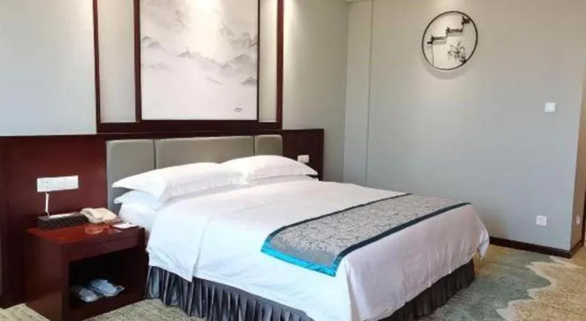 Bed in Yiyang Huatian Hotel