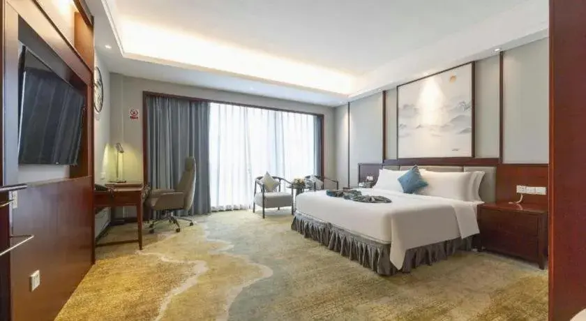 Bed in Yiyang Huatian Hotel Bed in Yiyang Huatian Hotel