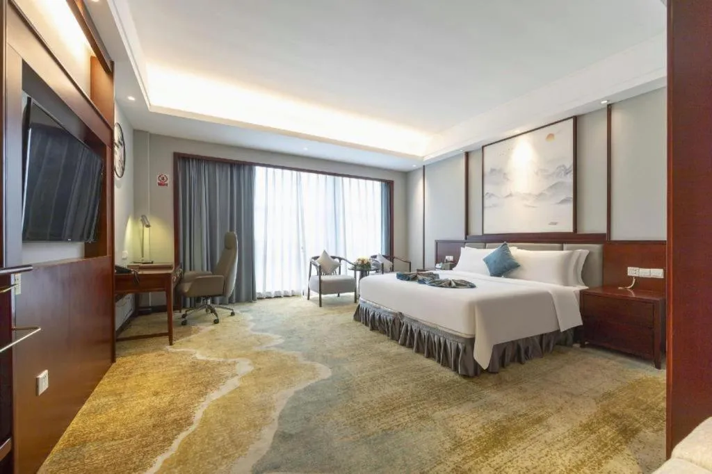 Bed in Yiyang Huatian Hotel