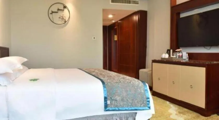 Bed in Yiyang Huatian Hotel