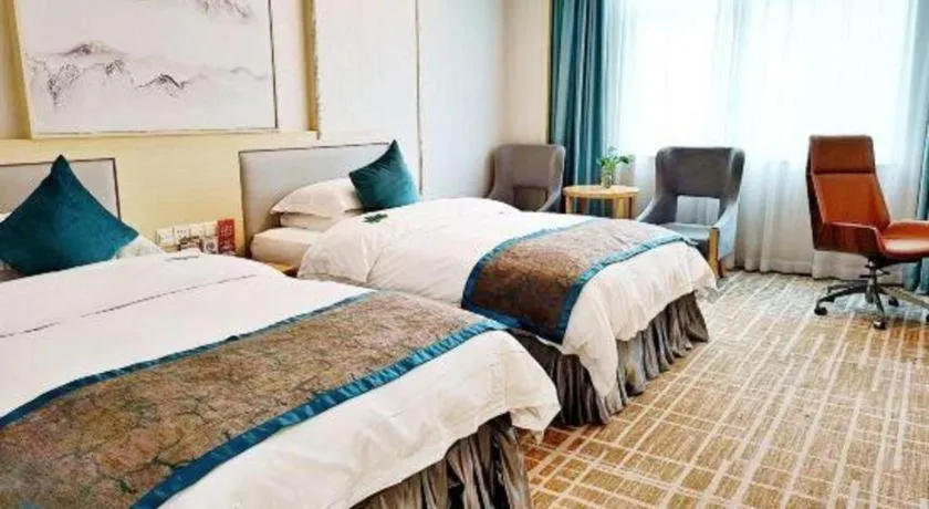 Bed in Yiyang Huatian Hotel