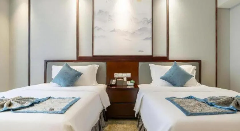 Bed in Yiyang Huatian Hotel
