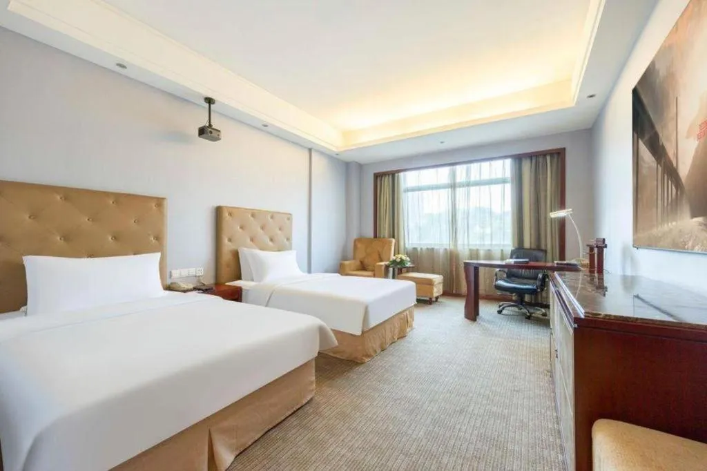 Bed in Yiyang Huatian Hotel