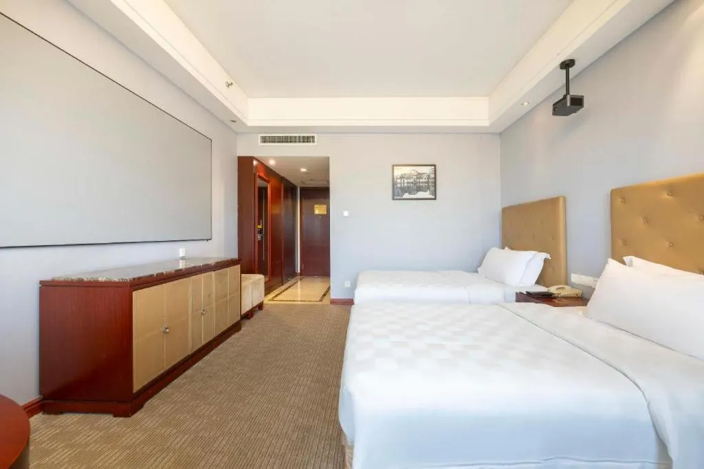 Bed in Yiyang Huatian Hotel