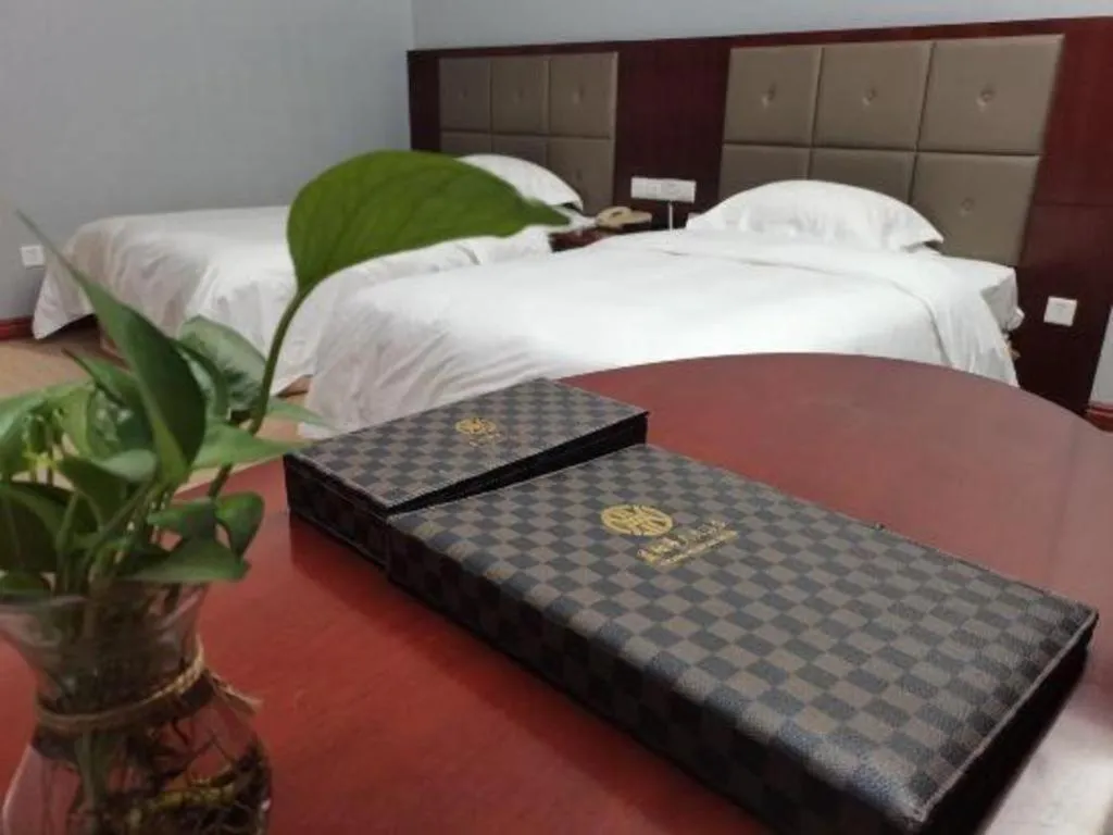 Bed in Yiyang Huatian Hotel