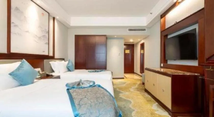 Bed in Yiyang Huatian Hotel