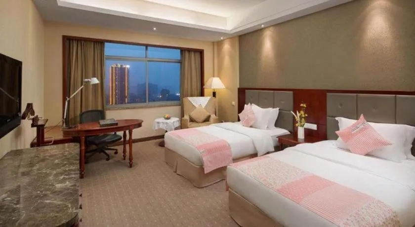 Bed in Yiyang Huatian Hotel