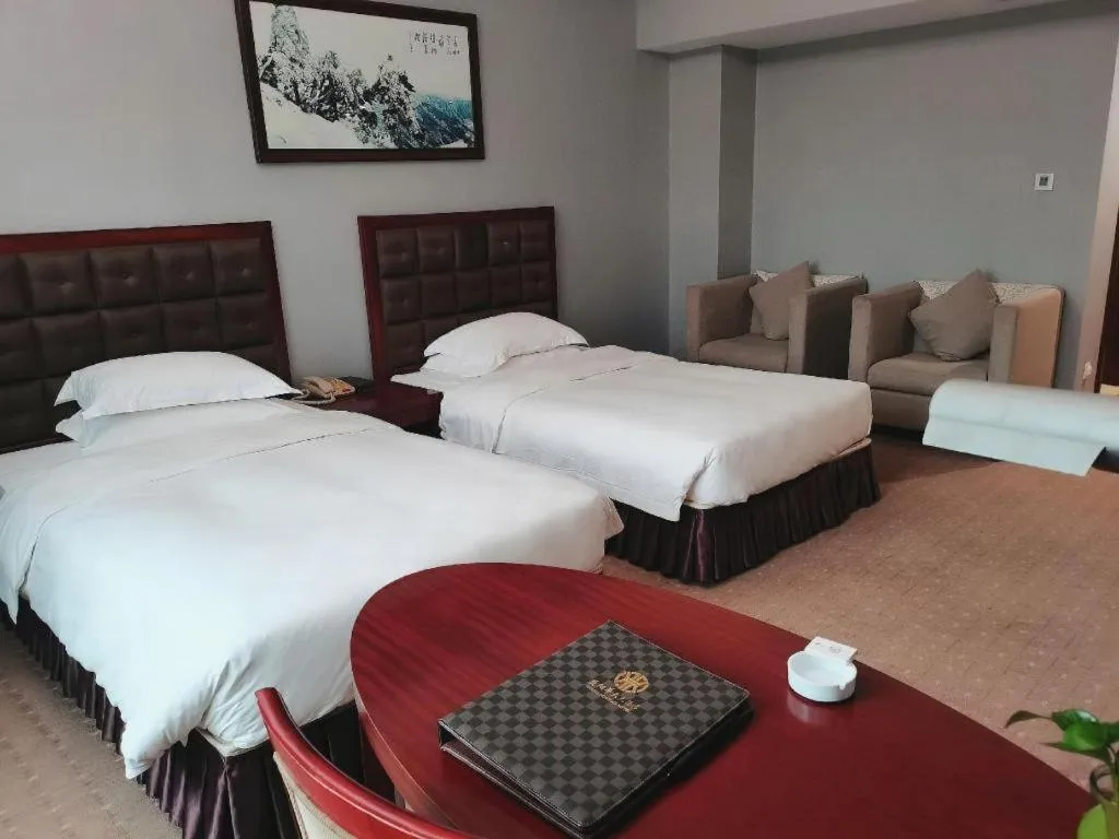 Bed in Yiyang Huatian Hotel