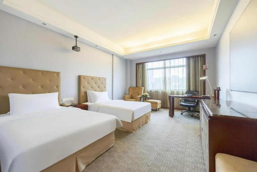 Bed in Yiyang Huatian Hotel