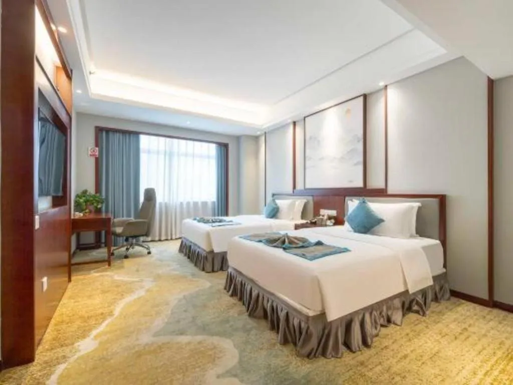 Bed in Yiyang Huatian Hotel