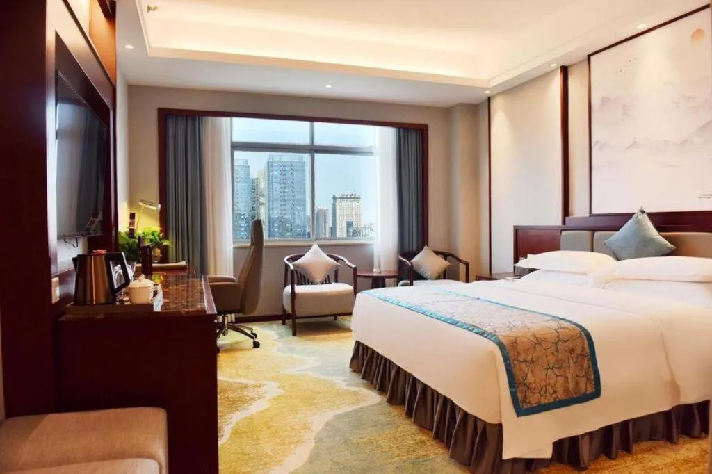 Bed in Yiyang Huatian Hotel