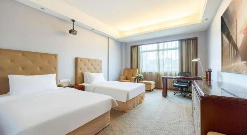 Bed in Yiyang Huatian Hotel