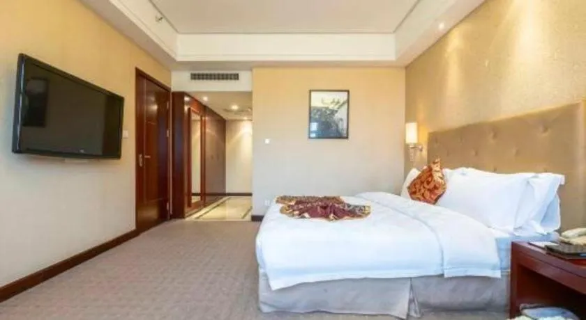 Bed in Yiyang Huatian Hotel