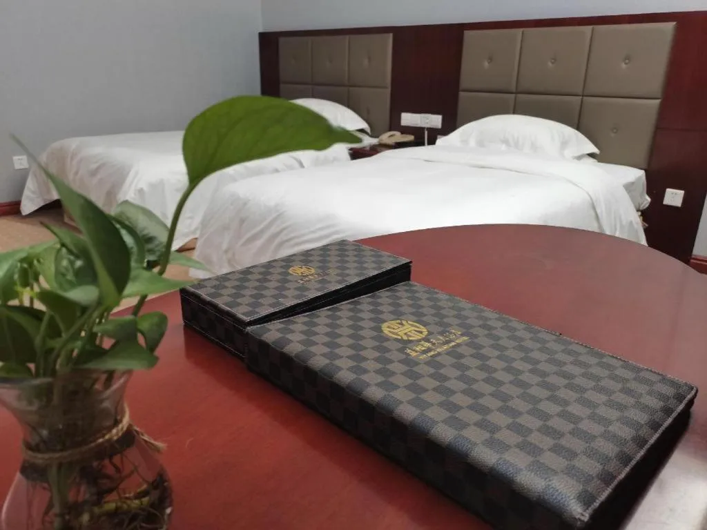 Bed in Yiyang Huatian Hotel