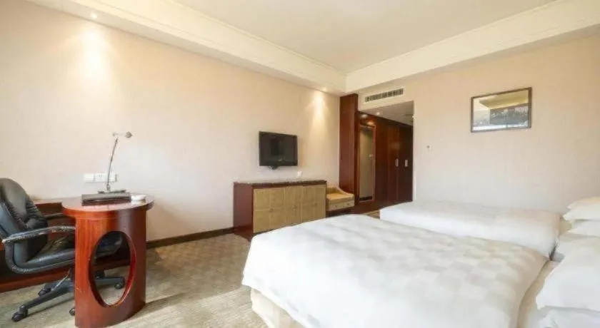 Bed in Yiyang Huatian Hotel