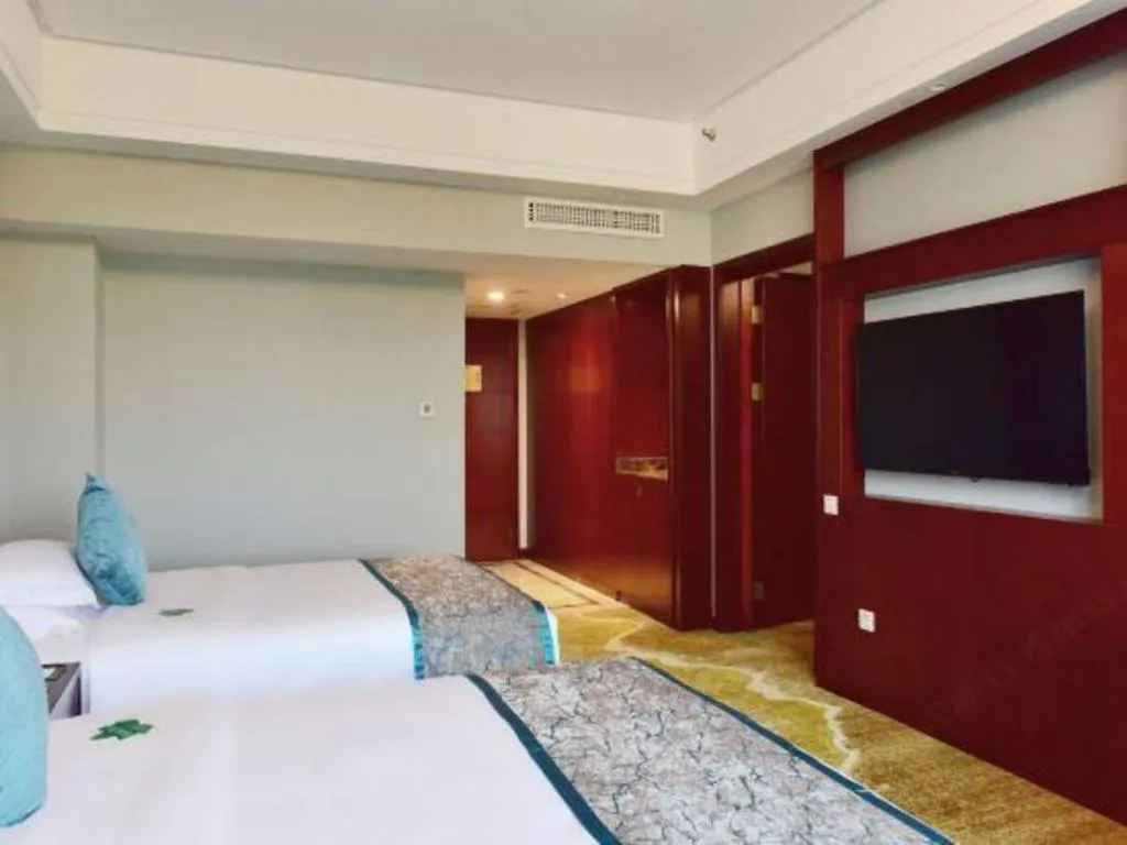 Bed in Yiyang Huatian Hotel