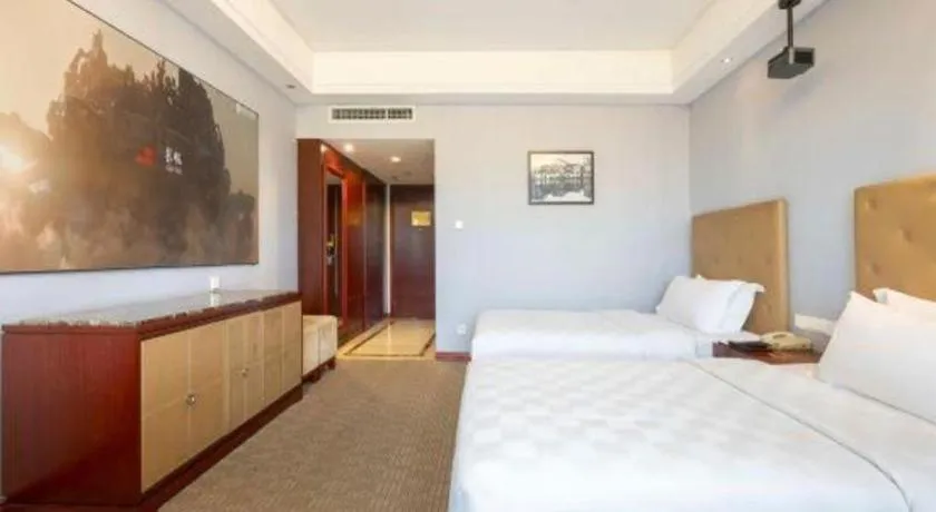 Bed in Yiyang Huatian Hotel