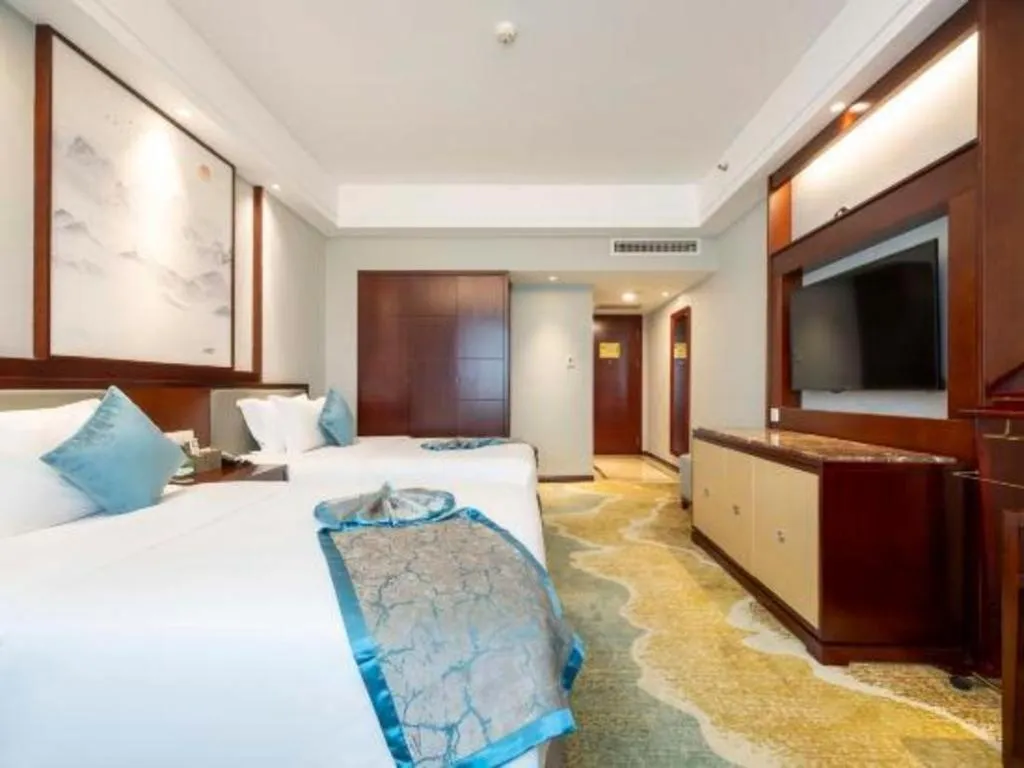 Bed in Yiyang Huatian Hotel